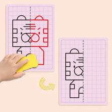 Yellow eraser effacing une ligne rouge sur un dessin de tigre dans 30 dessins symétriques grille pour enfants