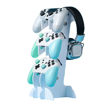 Support à trois niveaux en plastique bleu clair pour casque gaming avec trois manettes blanches et teal empilées verticalement