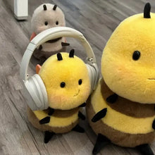 Peluche abeille kawaii jaune de 20 cm avec antennes noires et casque audio blanc peluche abeille kawaii