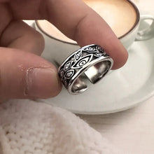 Bague ajustable yeux en argent avec motif gothique d yeux stylisés et feuilles argentée et ajustable yeux