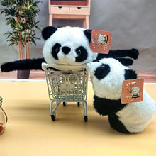 Bracelet peluche animal de 17 cm peluche animal noire et blanche dans un mini chariot metal doux et moelleux