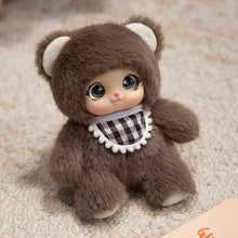 Peluche animal kawaii visage vinyle 18 cm ours marron avec grands yeux bleus et bavette à carreaux noir et blanc