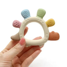 Anneau de dentition en silicone à reliefs en matière silicone coloré en forme de tortue pour déguisement carnaval
