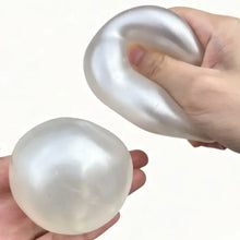Balle anti-stress squishy nacrée translucide à malaxer avec surface lisse et légèrement brillante