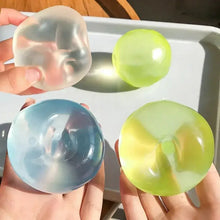 Balle anti-stress squishy nacrée en silicone translucide avec dégradé coloré surface lisse et brillante