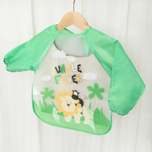 Bavoir tablier à manches longues vert avec devant transparent et motifs animaux jungle pour enfant