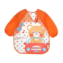 Bavoir tablier à manches longues orange avec ours en voiture rouge et motifs pois colorés et notes de musique