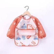Bavoir tablier à manches longues orange et blanc avec motifs de véhicules de chantier et nuages pour enfant