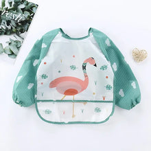 Bavoir tablier à manches longues avec design flamant rose sur panneau transparent et manches rayées teal
