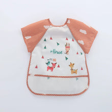 Bavoir tablier à manches longues blanc avec manches rayées orange et motifs animaux cartoon be brave dream big