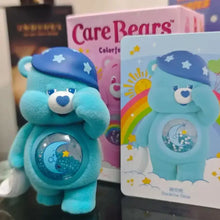 Figurine nounours câlin bleue en peluche avec bonnet étoilé et ventre liquide thème lune boîte mystère pop mart