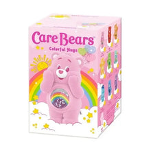 Nounours câlin rose en peluche avec fenêtre pailletée arc-en-ciel sur le ventre de la boîte mystère figurines nounours pop mart