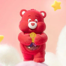 Un nounours câlin rouge en peluche tenant une étoile jaune souriante avec paillettes dans le ventre boîte mystère figurines nounours pop mart