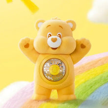 Figurine nounours câlin jaune avec soleil et étoile souriants dans le ventre boîte mystère pop mart