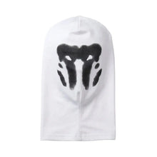Cagoule blanche en maille avec taches d’encre noir pour déguisement carnaval adulte vendue en magasins de jouets