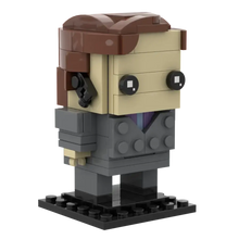 Figurine lego brickheadz beige en plastique abs habillée d un costume gris avec cravate violette pour véhicules miniatures camping-car en briques format pdf