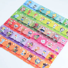 Une collection de cartes nfc animal crossing colorées en rangées arc-en-ciel pour collection cartes nfc collection animal crossing