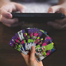 Cartes nfc splatoon 2026 avec design éclaboussé coloré et personnage inkling vert en encre néon vive