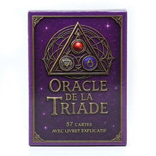 Boîte violette de cartes tarot oracle de la triade avec emblème triangulaire doré richesse symbolique outil puissant