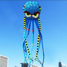 Cerf-volant pieuvre géante 3d de 8 m en bleu vif avec tentacules rayées jaunes et noires et accents rouges détaillés