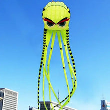 Cerf-volant pieuvre géante 3d de 8 m en néon jaune avec tentacules rayées noires et yeux rouges audacieux