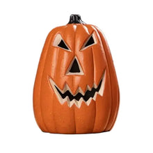 Citrouille lumineuse halloween décorative en plastique orange avec yeux triangulaires noirs et dents dentelées