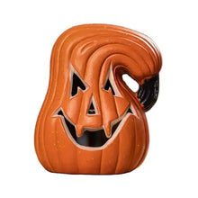 Citrouille lumineuse halloween en plastique orange avec yeux triangulaires et large sourire, tige noire décorative