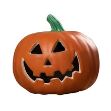 Citrouille lumineuse décorative en céramique orange avec tige verte et découpes triangulaires pour halloween