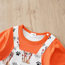 Combinaison bébé garçon orange et blanc avec imprimés cartoon roi lion sur le bavoir