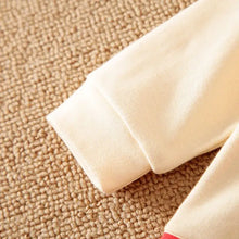 Combinaison bébé père noël crème à manches longues avec poignets côtelés doux en tissu confortable
