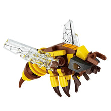 Construction lego moc insecte modèle abeille jaune et marron avec ailes transparentes et craquelées en lego moc