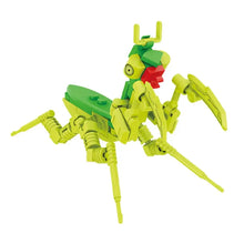 Modèle d’insecte en lego moc construction en plastique vert et rouge assemblé avec des blocs emboîtables
