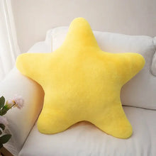 Coussin décoratif étoile en peluche jaune vif idéal pour coin lecture ou déguisement carnaval dans magasins de jouets