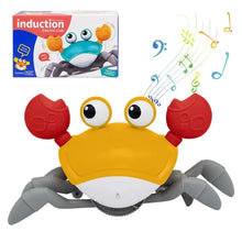 Crabe interactif musical jaune et rouge avec détection d’obstacles et jambes grises pour jeu ludique