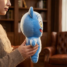 Peluche créature fantastique bleue avec yeux jaunes et bouche rouge pour chasseurs collection fantastique