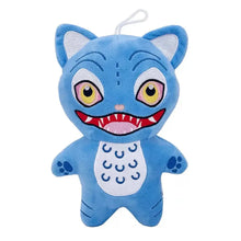 Peluche créature fantastique bleue avec oreilles blanches brodées, yeux jaunes, dents rouges et ventre à lunes bleues