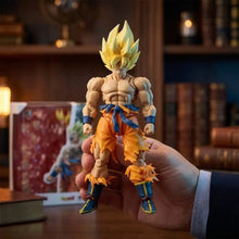 Figurine dbz super saiyan goku action figure détaillée avec cheveux dorés et pantalon orange usé dragon ball