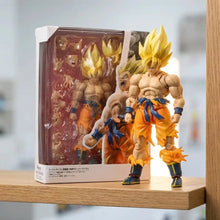 Figurine dbz super saiyan goku avec cheveux dorés en spiky et pantalon orange usé de dragon ball