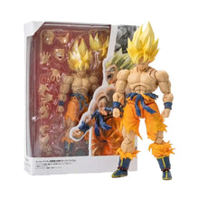 Figuine dbz super saiyan goku en tenue orange et bleue avec cheveux dorés présentée avec son emballage détaillé dragon ball