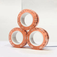 Lot de 3 anneaux magnétiques à manipuler translucides pêche avec bord texturé et noyau blanc intérieur