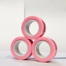 Lot de 3 anneaux magnétiques à manipuler roses empilés en formation triangulaire pour détente et concentration