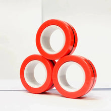 Lot de 3 anneaux magnétiques à manipuler rouges brillants avec noyaux blancs empilés en triangle