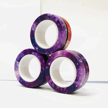 Lot de 3 anneaux magnétiques à manipuler avec rouleaux de washi tape thème galaxie violet et bleu à noyau blanc