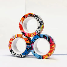 Lot de 3 anneaux magnétiques à manipuler avec motifs graffiti colorés et designs street art vibrants