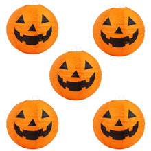 Lot de cinq lanternes citrouille halloween en papier orange avec yeux triangulaires noirs et bouche souriante 20 cm