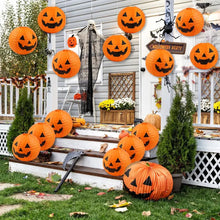 Lot de cinq lanternes citrouille halloween en papier orange 20 cm avec visages jack-o-lantern décoratives sur marches