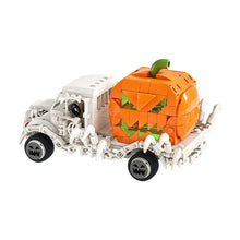 Jeu de construction carrosse citrouille avec camion lego blanc squelette transportant citrouille orange yeux verts