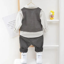 Ensemble de cérémonie garçon chemise gilet et pantalon noir et blanc motif pied-de-poule avec manches rayées et tailles proposées