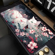 Tapis de souris xxl chat noir avec illustration de chat blanc aux yeux verts et fleurs de cerisier roses bord noir