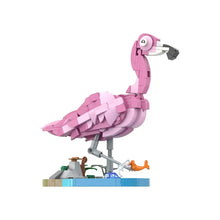 Modèle de construction flamant rose rose en lego avec bec noir et œil blanc sur base miniature de 287 pièces